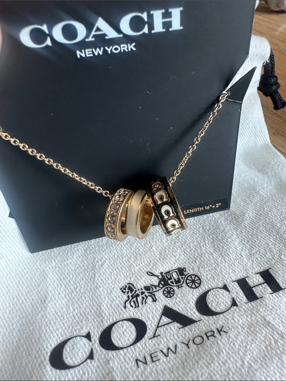 Coach Gold-Tone Triple Ring Pendant Necklace with White Accent